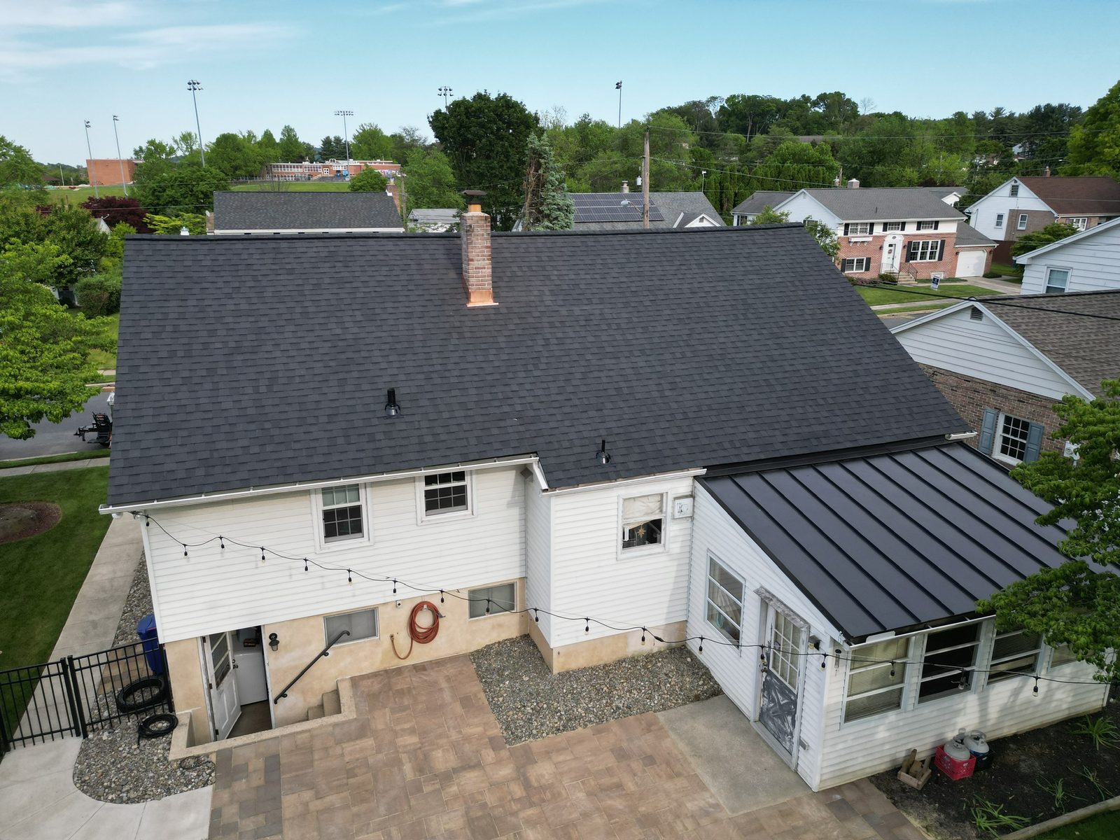 Drone view of an asphalt shingle roof with dormers in Shillington, PA