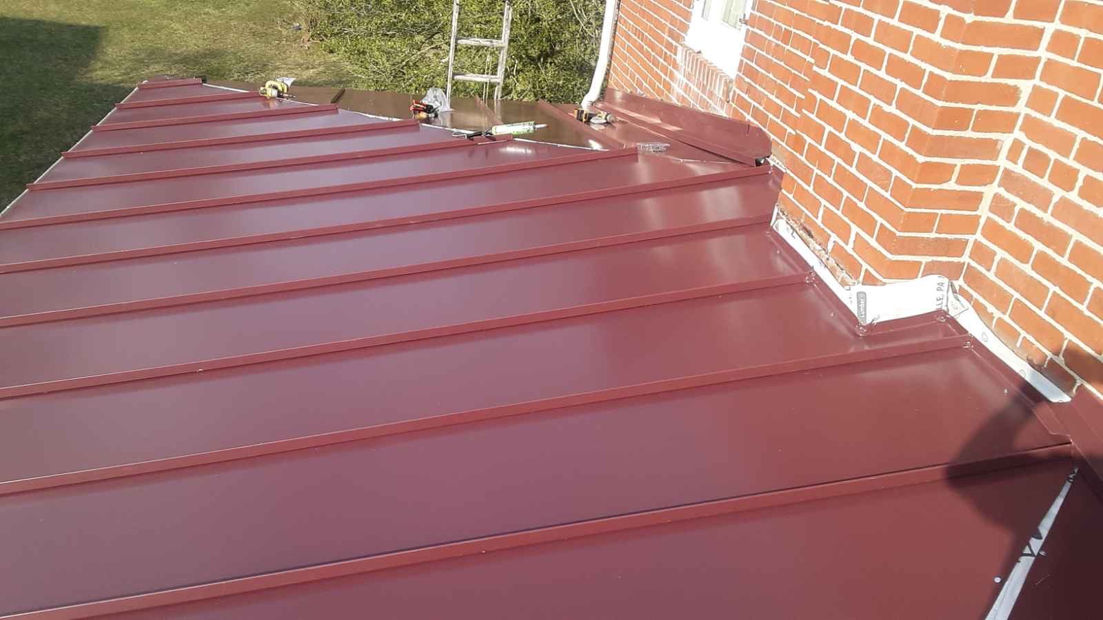 Red standing-seam metal roof in Sinking Spring, PA
