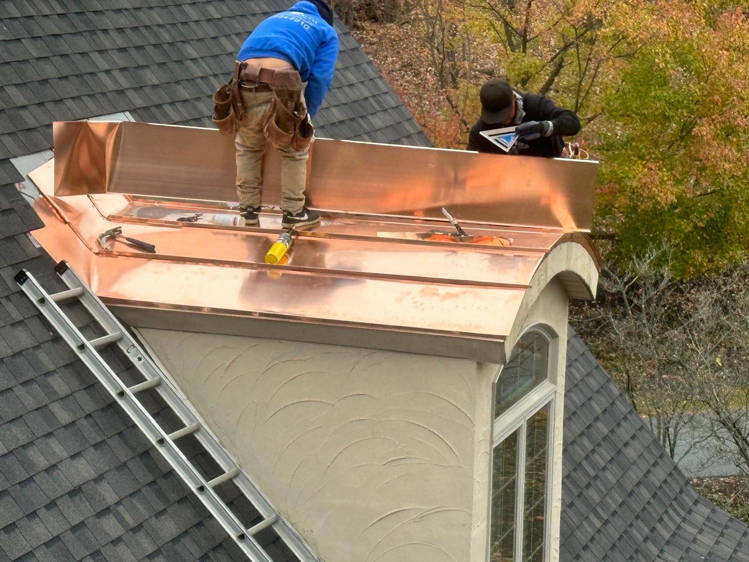 Roofer installing shingles in Sinking Spring, PA