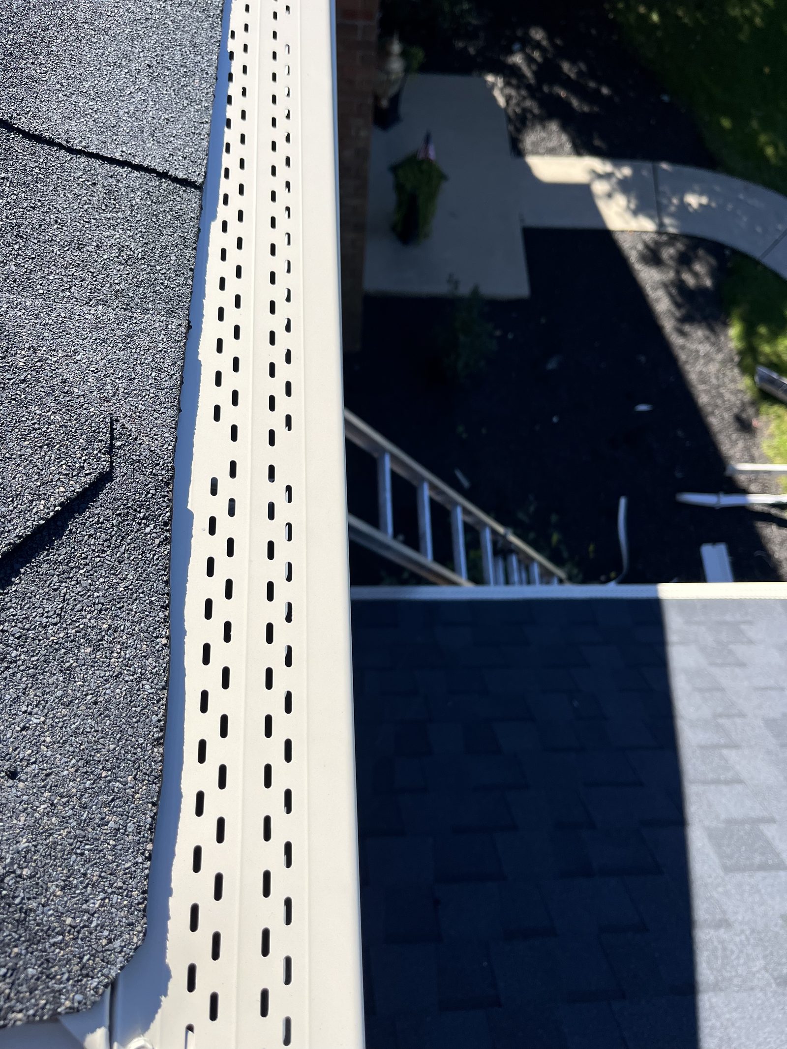 Step flashing detail where a shingle roof meets a sidewall in Sinking Spring, PA