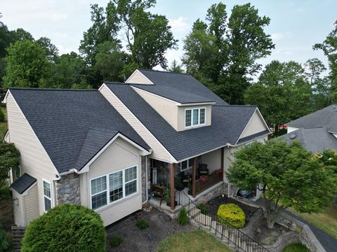 Drone view new roof covered porch home — Mohnton, PA