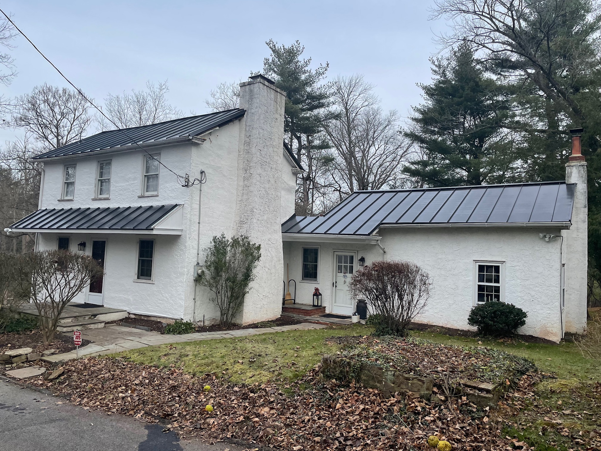Front shot of home with new metal roof