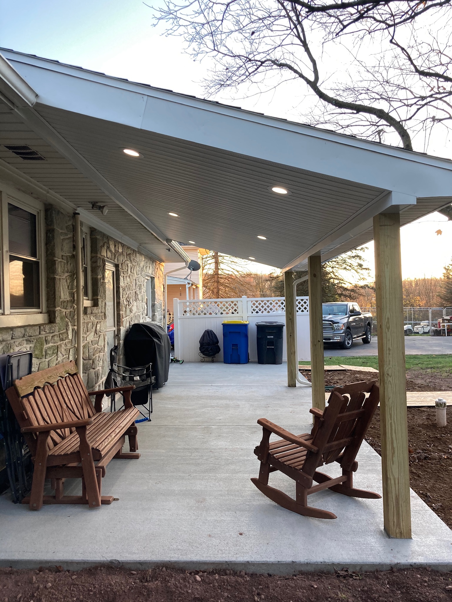 Newly remodeled covered porch with concrete foundation