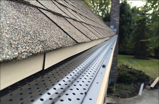 Close up shot of gutter system on home 