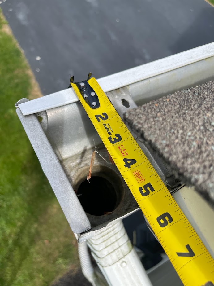 Close up shot of new drainage gutter on home 