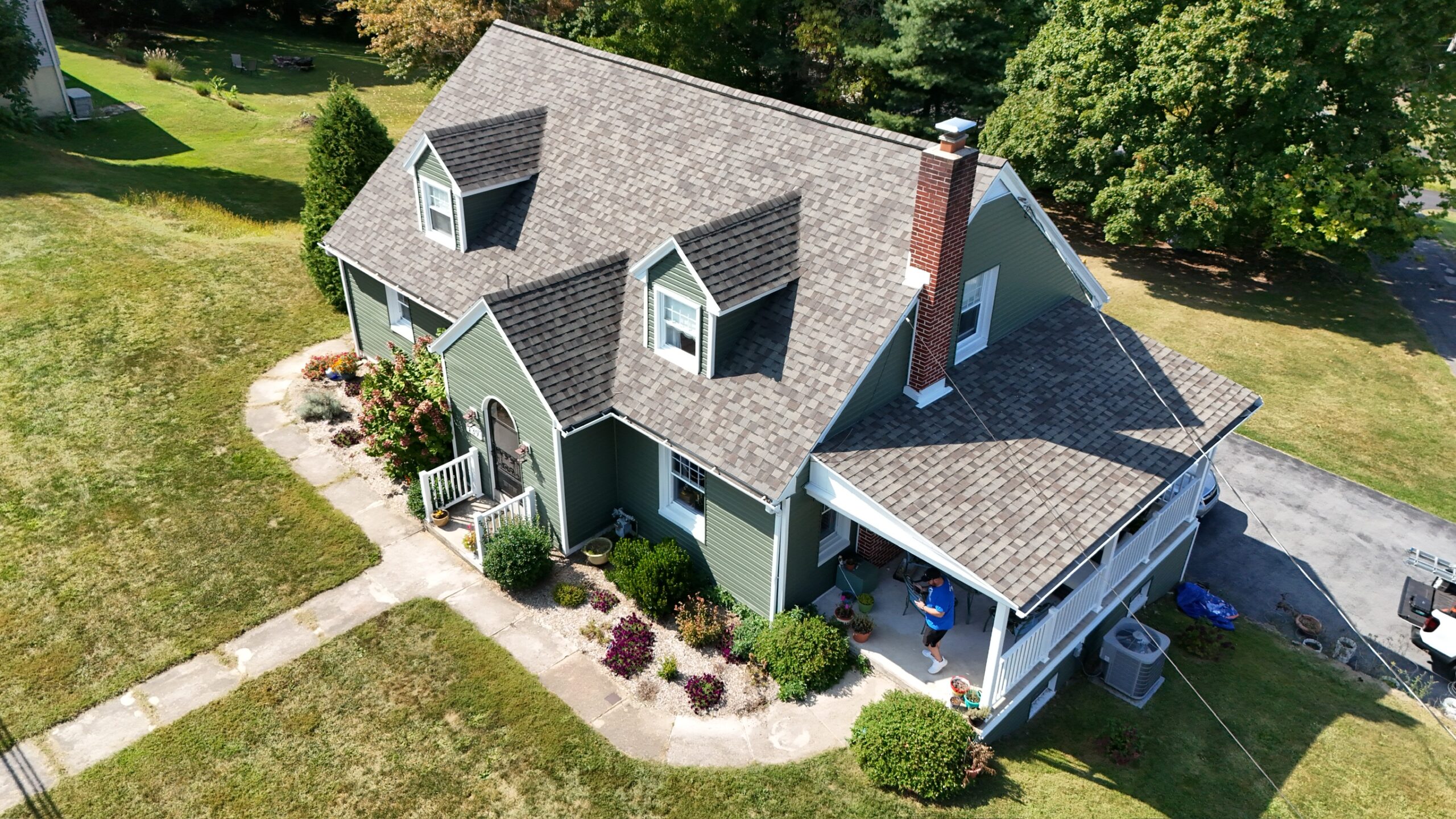 Aerial shot of home with new green siding